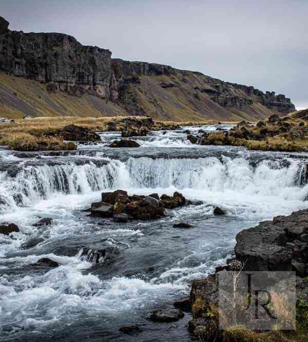 River landscape with rapids and rocky banks