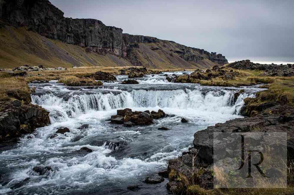 River landscape with rapids and rocky banks